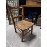 Early 20th C. oak and elm child's chair {61 cm H x 33 cm W x 34 cm D}.