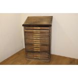 Oak printing cabinet with sixteen drawers including numbers and letters {124 cm H x 75 cm W x 50