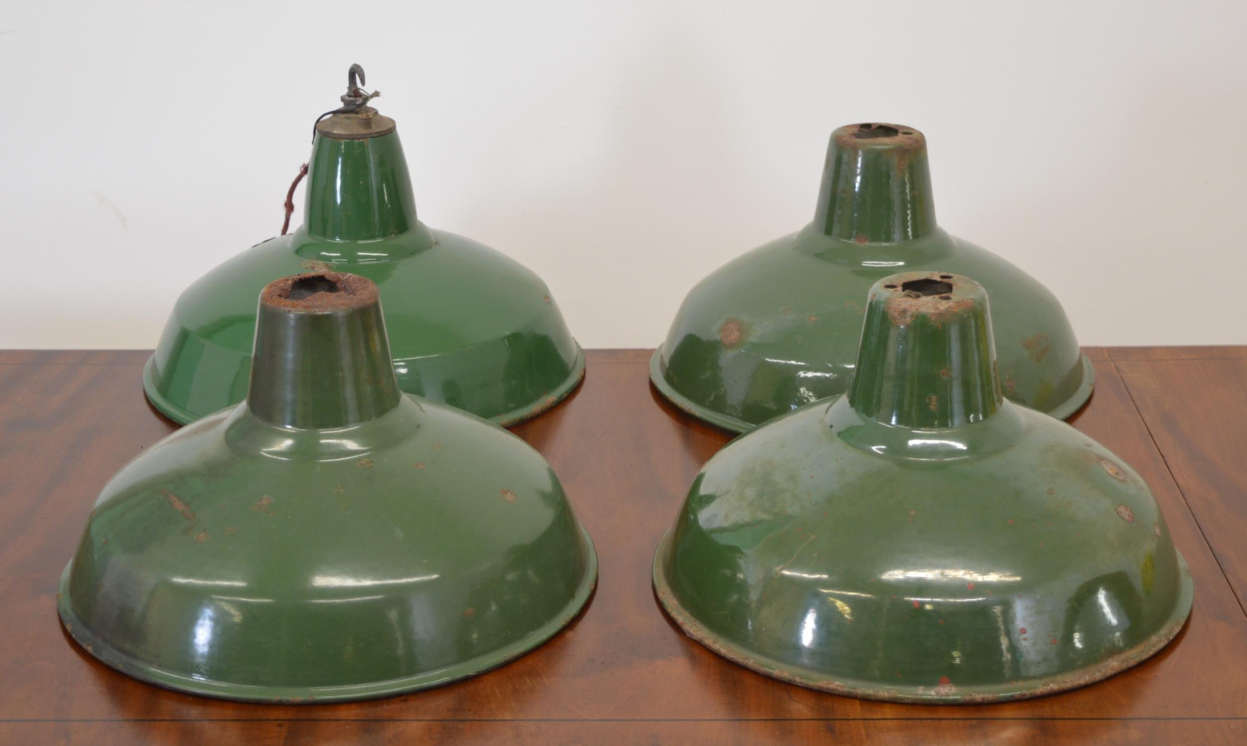 Set of four vintage green enamel industrial light shades {30 cm H x 35 cm W}.