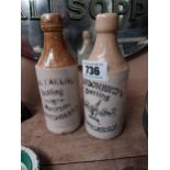 Two Ginger Beer bottles - N Carlin Londonderry and W G O Doherty Londonderry. { 20 cm H x 7 cm Dia}.