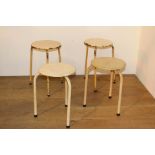 Set of four metal tubular stools {47 cm H x 30 cm Dia.}.