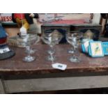 Set of five Babycham advertising glasses (not in box) and another {11cm H x 9cm Dia.}.