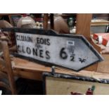 Clones bilingual alloy finger post road sign. {29 cm H x 87 cm W}.