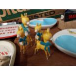 Set of four Babycham advertising figures {13cm H to 16cm H}.