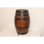 Oak metal bound barrel with brass tap {41 cm H x 28 cm Dia.}.