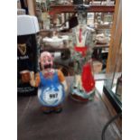 Glass brandy bottle in the form of a Bull Fighter and ceramic figure of a bar man {31 cm H and 19 cm