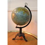 World globe on cast iron base {65 cm H x 30 cm Dia.}.