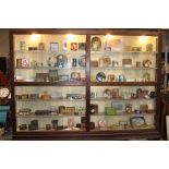 Oak glazed shop display cabinet with five shelves and sliding doors {218 cm H x 300 cm W x 31 cm