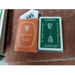 Two packs of Guinness advertising playing cards.