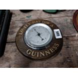 1950s oak Lovely Day For A Guinness advertising barometer {20 cm Dia.}.