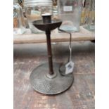 Engraved metal candle holder in the Arts and Crafts style {26 cm H x 18 cm Dia.}.