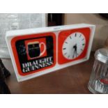 Draught Guinness Perspex advertising clock { x 36 cm W x 7 cm D}.