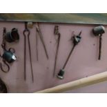 Collection of porringers, bayonet, tongs, drill and pipe.