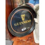 Guinness tin plate advertising drinks tray and Carlsberg tin plate drinks tray . {30 cm Dia}.
