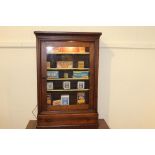 Mahogany display cabinet with single drawer over glazed door. { 94 cm H x 65 cm W x 18 cm D}.