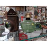 Early 20th C. tin plate bullseye oil lamp and green glass peg oil lamp {16 cm H x 10 cm Dia. And