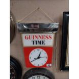 Guinness Time light up Perspex and chrome advertising clock. {43 cm H x 35 cm W x 7 cm D}.