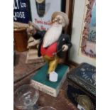 William Younger's double century ale advertising figure mounted on wooden base {36cm H x 20cm W x