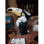 Ceramic Guinness toucan {35 cm H x 24 cm W x 9 cm D}.