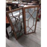 Three pairs of astragal glazed cupboard doors. { 107 cm H x 47 cm W} and {91 cm H x 44 cm W} and {87