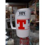 Tennent's Lager Wade pottery ceramic advertising water jug. {15 cm H x 14 cm W x 9 cm D}.