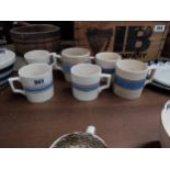 Six blue and brown stripped Carrigaline pottery ceramic mugs made in Republic of Ireland {Approx.