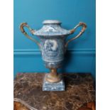 French blue and white ceramic urn with ormolu mounts {47 cm H x 41 cm W x 22 cm D}.