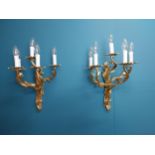 Pair of exceptional quality gilded bronze five branch wall sconces in the Rocco manner {56 cm H x 39