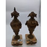 Pair of Victorian metal and marble urns on marble bases with damage {14 cm H x 13 cm W x 13 cm D}.