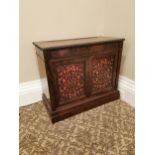 19th. C. rosewood side cabinet the single drawers above two fretwork panelled doors raised on plinth