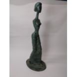 Contemporary bronze sculpture of The Wondering Woman {122 cm H x 49 cm W x 30 cm D}.