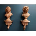 Pair of 19th C. plaster busts of Ladies on plaster wall bracket decorated with cherubs {68 cm H x 20