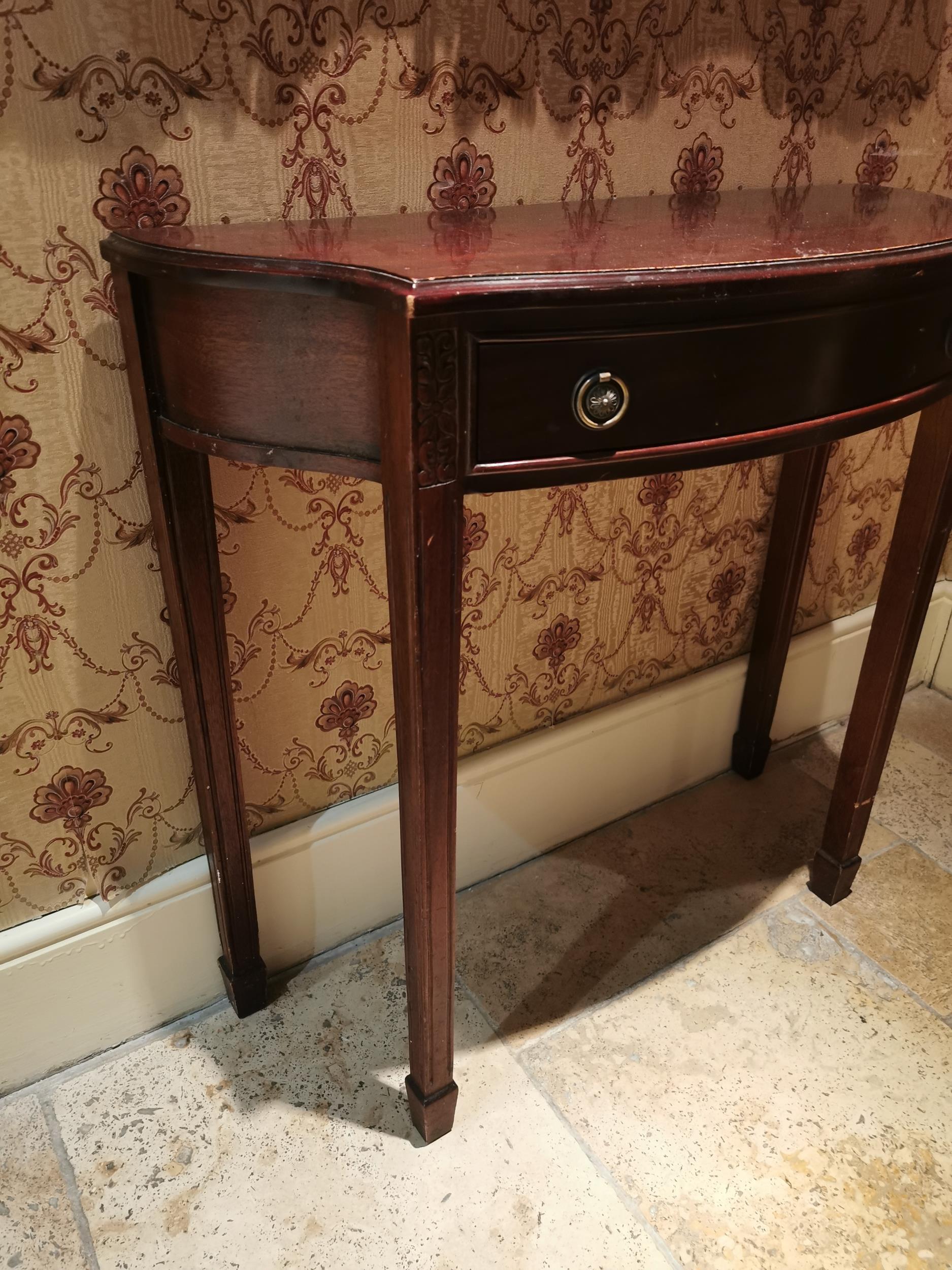 Mahogany consul table, the shaped top above a single drawer in the frieze raised on tapered legs, in - Image 2 of 2