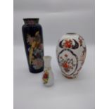 Two hand painted ceramic Oriental vases and another {29 cm H, 24 cm H and 14 cm H}.