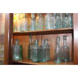Collection of twenty glass sauce bottles {Tallest H 19cm down to H 14cm}.