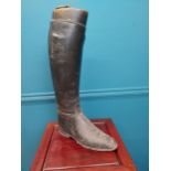 Leather riding boot {50 cm H x 25 cm W}.