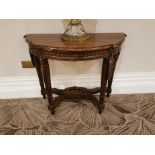 Decorative carved mahogany side table {80 cm H x 98 cm W x 47 cm D}
