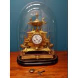 Good quality French gilded metal mantle clock in glass dome {54 cm H x 40 cm W x 21 cm D}.