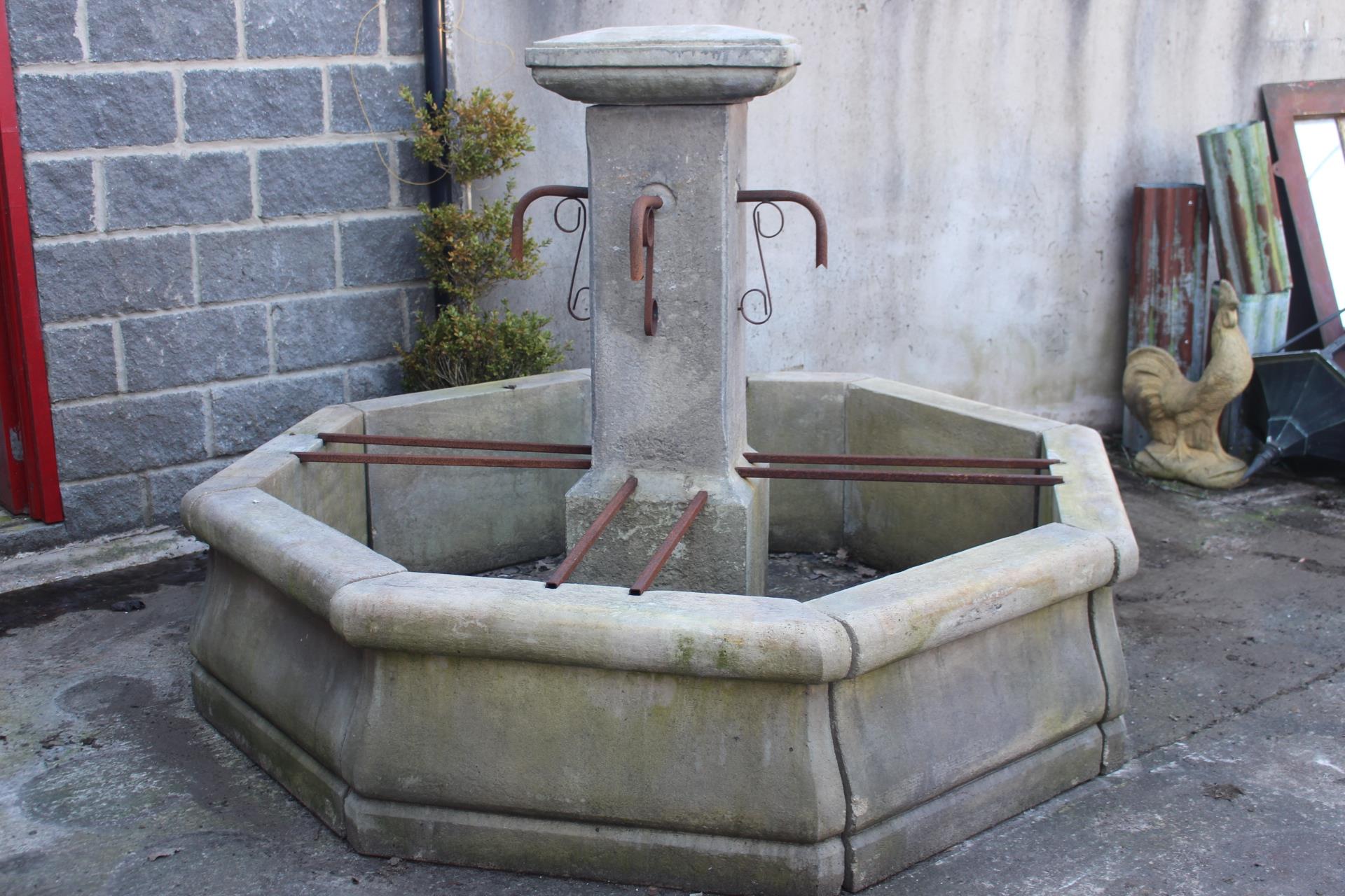 Stone octagonal central fountain {H 150cm x Dia 200cm}.