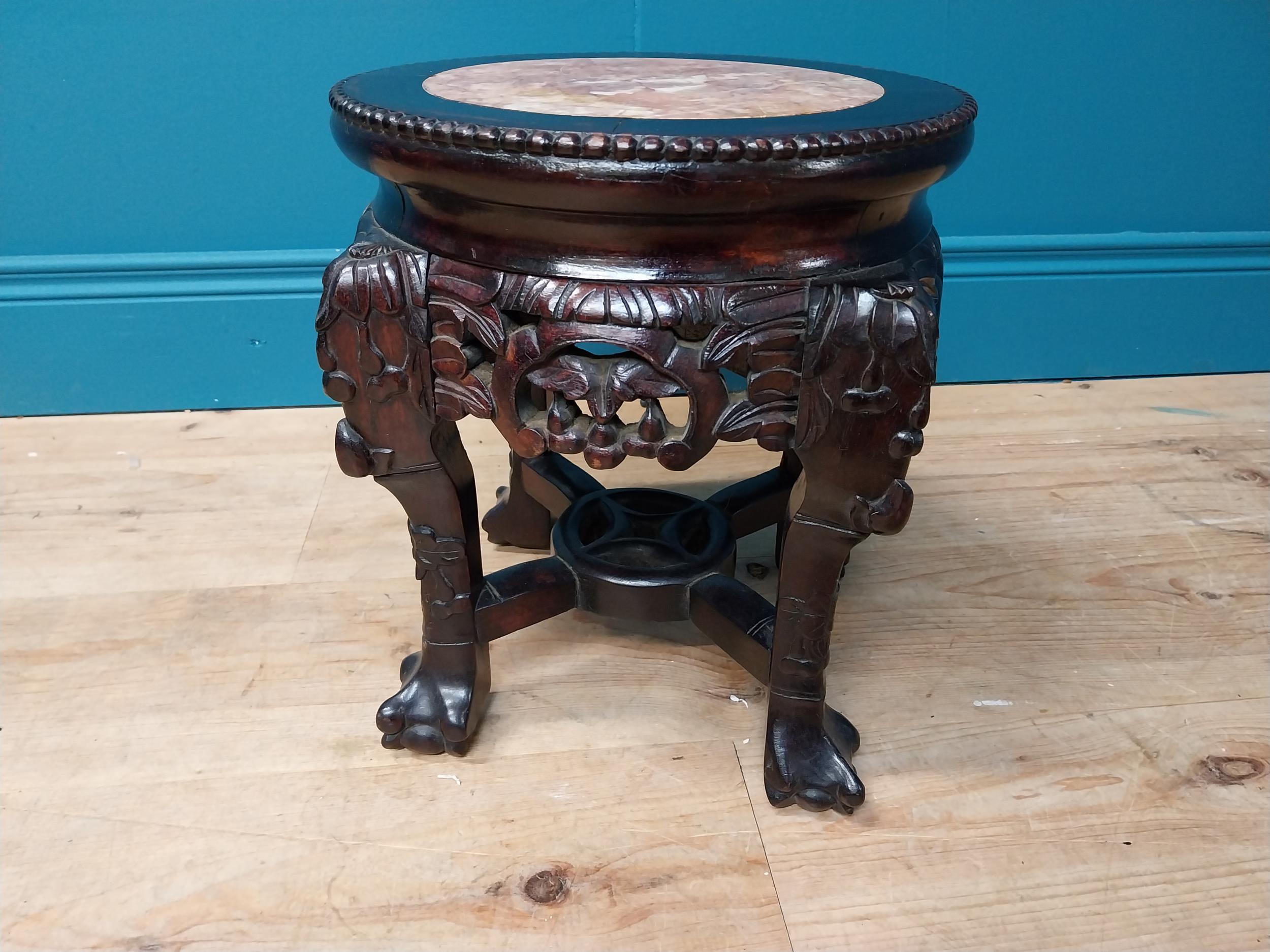Carved hardwood jardiniere stand with inset marble top in the Chinese style. {34 cm H x 30 cm Diam}