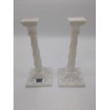 Pair of ceramic candlesticks decorated with swags in the Grecian style {26 cm H x 12 cm W x 12 cm