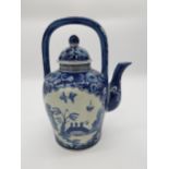 Oriental blue and white ceramic teapot. {30 cm H x 23 cm W x 15 cm D}.