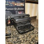 1950's Oliver typewriter {24 cm H x 48 cm W x 34 cm D}.