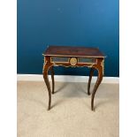 Decorative inlaid kingwood side table with gilded brass mounts in the frieze with a oval plaque