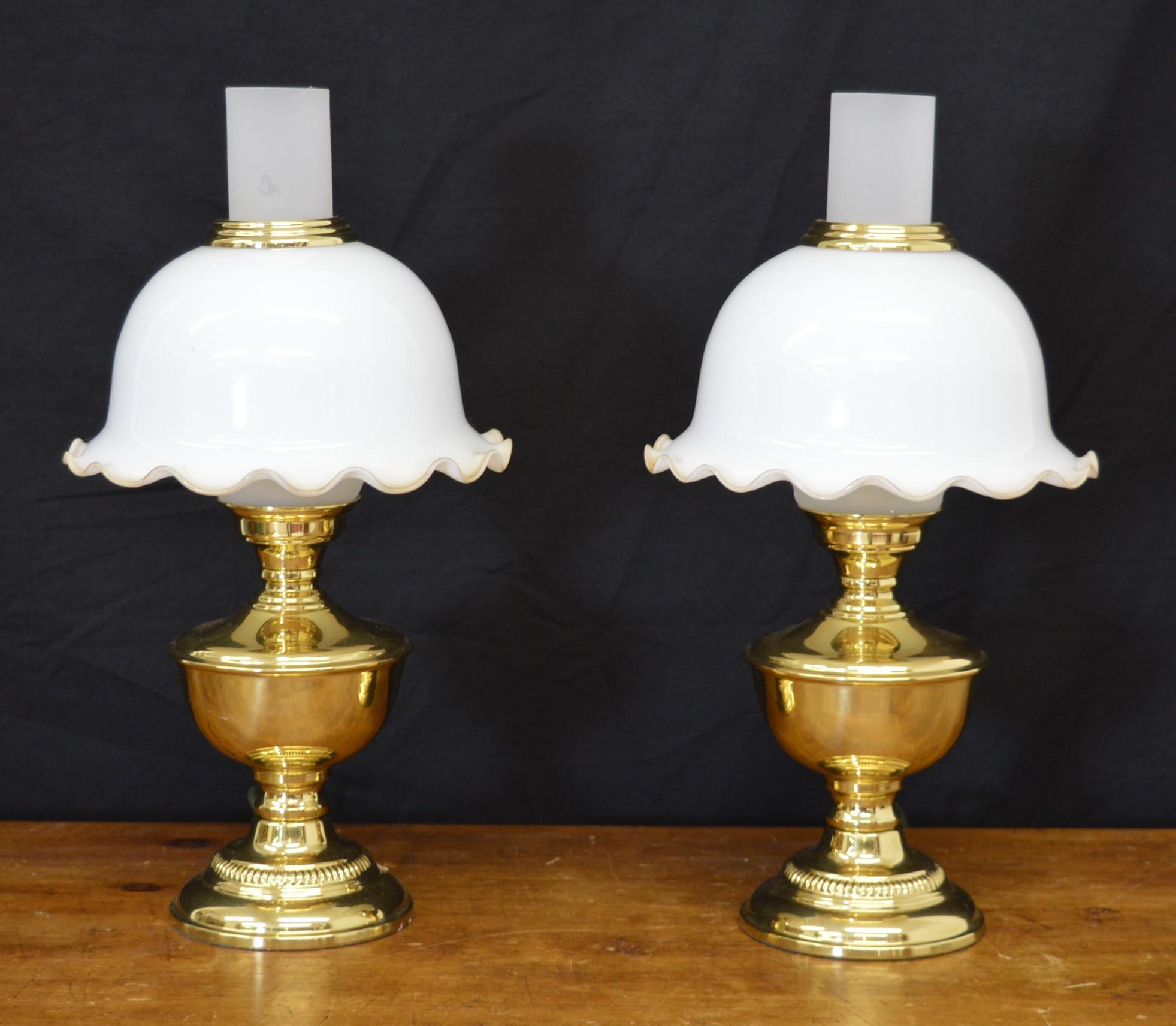 Pair of brass table lamps with milk glass shades in the Victorian manner.{43 cm H x 22 cm W}.