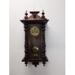 Early 20th C. mahogany Vienna wall clock with enamel dial {82 cm H x 37 cm W x 18 cm D}.