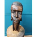 Carved African bust. {36 cm H x 15 cm W x 21 cm D}.