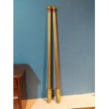 Pair of good quality gilded curtain poles {217 cm L}.