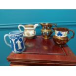 Two early 20th C. Royal Doulton water jugs and two Lustre water jugs {12 cm H and 11 cm H}.