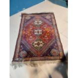 Decorative Persian carpet square {185 cm L x 110 cm W}.